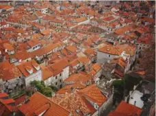  ??  ?? The vibrant rooftops of Dubrovnik’s Old Town lie below the 16th-century stone walls that circle the area.