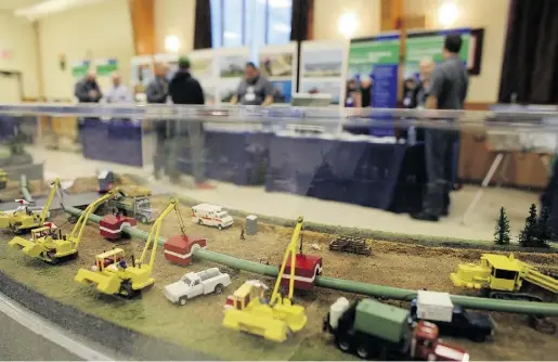  ?? Da ve Chan for National Post ?? A model of a pipeline constructi­on on display in Brinston, Ont., one of the communitie­s across Canadawher­e TransCanad­a held informatio­n sessions on the Energy East Pipeline for local residents.