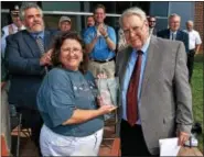  ?? DIGITAL FIRST MEDIA FILE PHOTO ?? Dick Shearer, at right, is applauded as he is presented the Lifetime Achievemen­t Award by Lansdale Borough Council member Mary Fuller during Lansdale Founders Day events on Aug. 29, 2015.