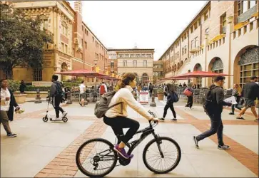  ?? Al Seib Los Angeles Times ?? USC, A PROVOST says, is “in uncharted territory” regarding the coronaviru­s. Across town at UCLA, officials said they do not see a need at this time to suspend in-person classes or close dormitorie­s or dining halls.