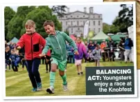  ??  ?? BALANCING ACT: Youngsters enjoy a race at the Knobfest
