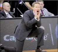 ?? AP/RICK BOWER ?? Gonzaga Coach Mark Few is trying to get his team to the Final Four of the NCAA Tournament for the first time, but the Bulldogs have a tough test tonight in the Sweet 16 against West Virginia.