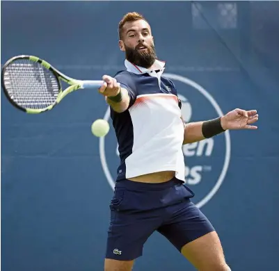 ??  ?? Spirited display: Benoit Paire of France returns a volley to Ugo Humbert of France in the third round of the Winston-Salem Open tennis tournament on Wednesday. Paire prevailed to reach the quarter-finals. — AP