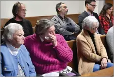  ?? CHRIS CHRISTO — BOSTON HERALD ?? Susan Kenney whose father Charles Lowell died in the soldiers home COVID outbreak wipes tears from her eyes during Bennett Walsh’s change of plea hearing in Hampshire County Court. At left is her mother Alice Lowell.