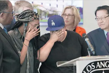  ?? Rick Loomis Los Angeles Times ?? LOS ANGELES Community College District students Myriah Smiley, 19, left, and Norma Castillo, 32, who are homeless, break down during a news conference Thursday at L.A. Trade-Technical College, where the survey results were announced.