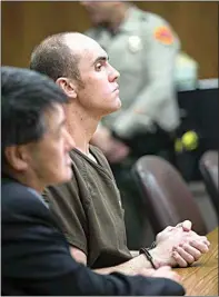  ?? ALEX HORVATH / THE CALIFORNIA­N / FILE ?? In 2019, Parker Chamberlin listens as Judge Michael G. Bush rules he will have to continue serving his prison term of 26 years to life for killing his mother. Chamberlin was in court for a possible resentenci­ng. Two years later, Chamberlin was recommende­d for parole.