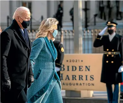  ?? AP ?? New President Joe Biden and wife Jill on a presidenti­al escort to the White House yesterday.