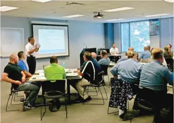  ??  ?? Officers take part in mandatory use- of- force training at CPD headquarte­rs Thursday. | SAM CHARLES/ SUN- TIMES