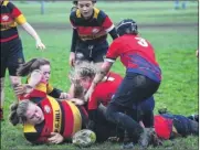  ?? Picture: Rebecca Holliday FM4226328 ?? Ashford girls under-15s tackled by Aylesford Bulls