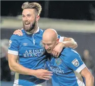  ?? Conor Molloy ?? ●● Chris Holroyd and Danny Whitaker celebrate goal number three