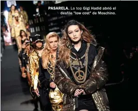  ??  ?? PASARELA. La top Gigi Hadid abrió el desfile "low cost" de Moschino.