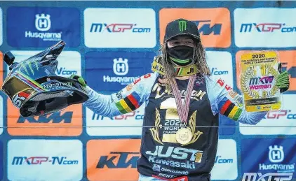  ?? PHOTOS: MXGP ?? Twice the fun . . . Dunedin’s Courtney Duncan celebrates winning the Women’s World Motocross Championsh­ip title for a second consecutiv­e year; Duncan punches the air when she crosses the finish line to seal her championsh­ip win.