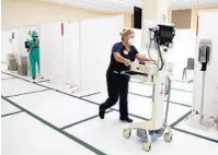  ?? CARLINE JEAN/SOUTH FLORIDA SUN SENTINEL ?? Nurse Kristy Simpson of Memorial Regional Hospital in Hollywood is seen Monday inside the temporary pre-admission testing center.