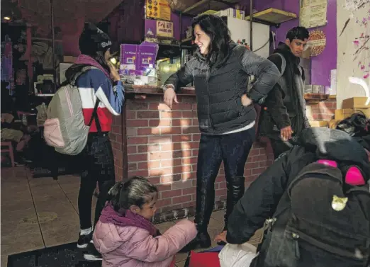  ?? JOSH MORGAN/USA TODAY ?? Ariadna Phillips, founder of South Bronx Mutual Aid, helps migrants at La Morada, a restaurant that has become a safe haven for asylum-seekers.