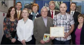  ??  ?? Frank McCarthy and Frank Murphy from Clonegal Tidy Village Committee with the Beautiful award.