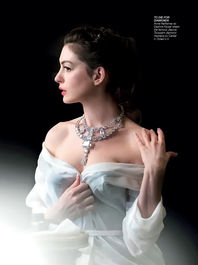  ??  ?? TO DIE FOR DIAMONDS Anne Hathaway as Daphne Kluger wears the famous Jeanne Toussaint diamond necklace by Cartier in Ocean’s 8