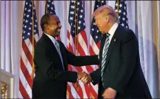  ?? CAROLYN COLE/LOS ANGELES TIMES ?? Dr. Ben Carson endorses Republican presidenti­al candidate Donald Trump at Trump’s resort Mar-a-Lago on March 11 in Palm Beach, Fla. Trump has chosen Carson to run the Department of Housing and Urban Developmen­t.