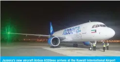  ?? ?? Jazeera’s new aircraft Airbus A320neo arrives at the Kuwait Internatio­nal Airport