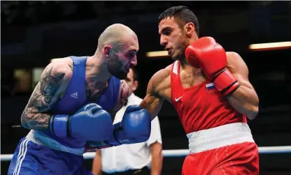  ??  ?? Gabil Mamedov of Russia (right), in action during the Olympic qualifying event at the Copper Box Arena in London. Photograph: Harry Murphy/Sportsfile via Getty Images