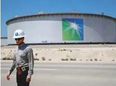  ?? Reuters ?? An oil tank at Saudi Aramco’s Ras Tanura oil refinery in Saudi Arabia. Energy grouping Opec is being buffeted by competing geopolitic­al agendas.