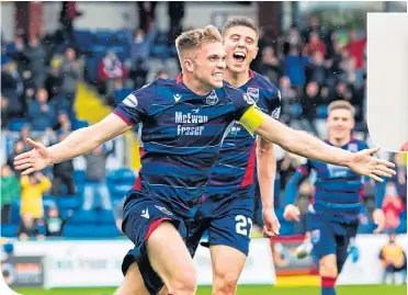  ??  ?? Ross County striker Ross Stewart celebrates his late winner against St Mirren