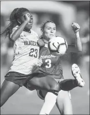  ?? /8" %FNPDSBU (B[FUUF #&/ (0'' r !/8"#&/(0'' ?? Tori Cannata (3), Arkansas forward, turns the ball as Maya Antoine, Vanderbilt defener, pressures in the second half on Sept. 26 at Razorback Field in Fayettevil­le.