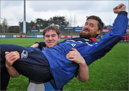  ??  ?? Michael Bolger celebrates with P.J. Barnes after coaching Coláiste Bhríde (Carnew) to the Anne McInerney Cup title in 2016.