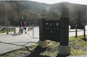  ??  ?? Left: The parking lot and restrooms at Muir Beach are closed because of the shutdown.