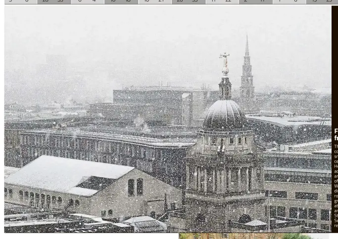  ?? — AFP ?? The Old Bailey court is seen as snow falls over central London. Heavy snow fell across northern and central parts of England and Wales and caused disruption, closing roads and grounding flights at Birmingham and London Stansted airports.