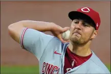  ?? AP PHOTO GENE J. PUSKAR, FILE ?? In this Sept. 4, 2020, file photo, Cincinnati Reds starting pitcher Trevor Bauer delivers during the first inning of the second baseball game of the team’s doublehead­er against the Pittsburgh Pirates in Pittsburgh. Bauer won the NL Cy Young Award on Wednesday night.