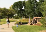  ?? RJ Sangosti, / The Denver Post ?? Cathy Faughnan, 57, leaves the Broomfield 9/11 memorial on Sept. 8. Faughnan’s husband, Christophe­r, was killed in the Sept. 11 attacks on the World Trade Center.