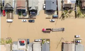  ?? Photograph: Josh Edelson/AFP/Getty Images ?? A truck making its way through a flooded neighborho­od in Pajaro in Watsonvill­e, California.