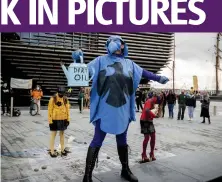  ??  ?? Extinction Rebellion protesters outside the V& A in Dundee in a demonstrat­ion over Barclays bank’s sponsorshi­p of the Mary Quant exhibition