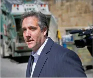  ?? AP PHOTO BY SETH WENIG ?? Attorney Michael Cohen walks down the sidewalk in New York, Wednesday, April 11.