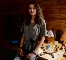  ?? ALICE MARTINS/WASHINGTON POST ?? Magdalyna, 27, a former florist, now builds drones with parts imported from China at her home outside of Kyiv.