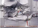  ?? EUGENE HOSHIKO/ASSOCIATED PRESS ?? A damaged part of the USS Fitzgerald is seen at the U.S. Naval Base in Yokosuka southwest of Tokyo on Sunday. The vessel collided with a container ship Saturday off the Japanese coast.