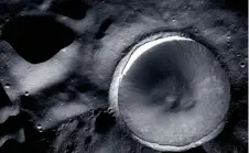  ?? ?? LEFT The interior of the Shackleton Crater at the lunar south pole is perpetuall­y in shadow