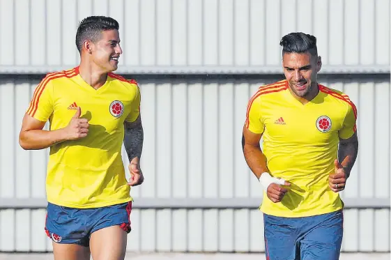  ?? AFP ?? En la dupla de James Rodríguez (izq.) y Radamel Falcao García confía el país para que sea la conductora de una victoria que le permita al equipo avanzar en Rusia 2018.