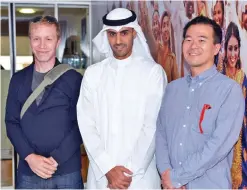  ??  ?? KUWAIT: Zain Group Vice Chairman Bader Nasser Al-Kharafi with Mark Kawano and Timothy Donnelly.