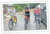  ??  ?? (L-R) Bir, Kabir and Sangeeta enjoy their time cycling together