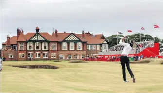  ?? THE ASSOCIATED PRESS ?? Germany’s Sandra Gal takes her second shot on the 18th fairway during Day 1 of the Women’s British Open at Royal Lytham & St. Annes Golf Club, near Lytham, England, on Thursday.