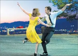  ?? Dale Robinette Lionsgate ?? EMMA STONE and Ryan Gosling dance on a Griffith Park hilltop overlookin­g the lights of Burbank in “La La Land.” The site has become a popular tourist stop.