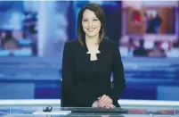  ?? (Ahiav Hosri) ?? GHADIR KAMAL MERIACH delivers the news on Channel 1.