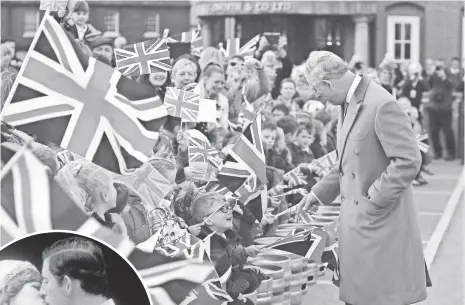  ?? WPA POOL VIA GETTY IMAGES ?? Prince Charles greets young well-wishers while touring the Wadworth Brewery last month in Wiltshire, England.