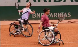  ?? Photograph: Clive Brunskill/Getty Images ?? Alfie Hewett and Gordon Reid celebrate after winning match point.