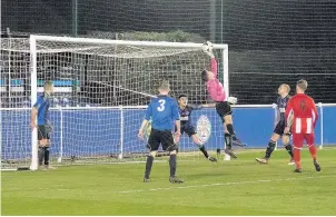  ??  ?? The Anstey keeper tips the ball onto the bar during the Leicesters­hire and Rutland County F.A. Sunday Premier Cup Final. Picture by Malcolm Heaven.