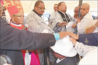  ?? Photo: Contribute­d ?? Rest in peace … The late Bishop Hendrik Frederick (red gown).