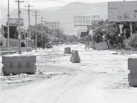  ?? AP ?? A street alongside the United States embassy compound is devoid of traffic in Port-au-Prince, Haiti, Sunday, March 10, 2024. The US military said Sunday that it had flown in forces to bolster security at the delegation and facilitate the departure of non-essential personnel.