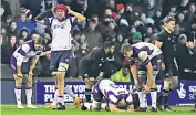  ??  ?? Putting on a show: Huw Jones (above) scores Scotland’s second try; (left) the squad’s players show their frustratio­n at the match’s close