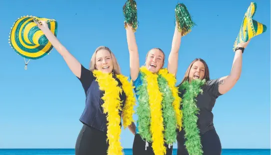  ??  ?? Gold Coast is hosting a special event to celebrate the 2032 Olympics announceme­nt at Broadbeach’s Kurrawa Park on Wednesday evening. Kurrawa SLSC members Tracy Gardner, Simone van Eck and Katie Kiddie are ready to celebrate. Picture: Glenn Hampson